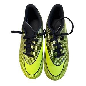 Nike black and yellow cleats size 3.5